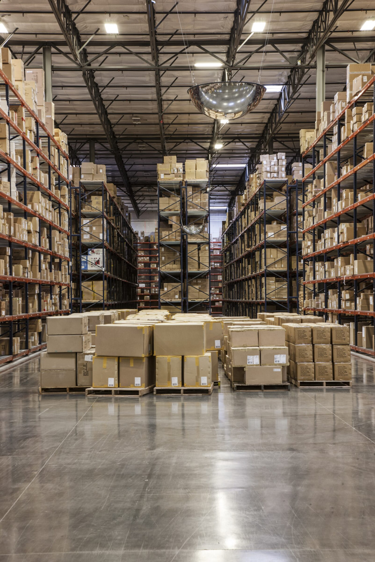 Pallet racking stacked with stock in a distribution warehouse